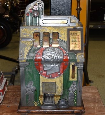 mills roman head slot full coin.jpg