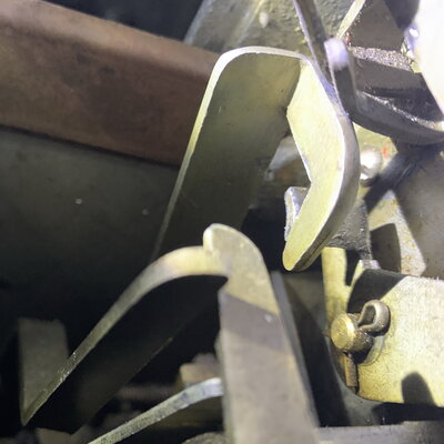 Coin advance hook and lever.jpg